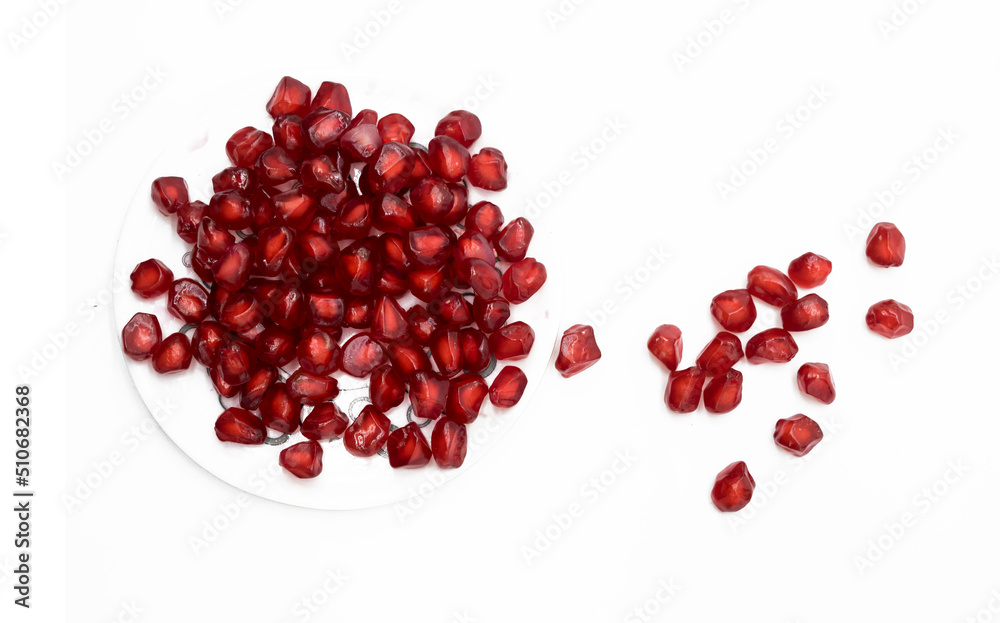 Pomegranate seeds isolated on white background With clipping path. Full depth of field. Pomegranate seeds isolated on white background With clipping path. Full depth of field.