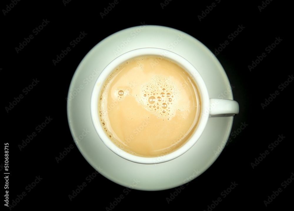 Cup of coffee and milk on black background Cup of coffee and milk on black background