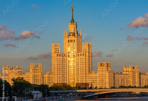 Kotelnicheskaya Embankment Building (one of seven Stalin skyscrapers) and Moskva river at sunset, Moscow, Russia