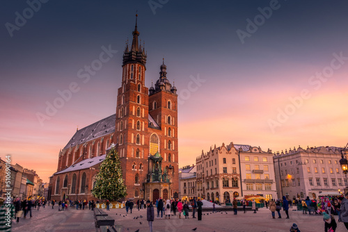 Sunset over the St. Mary's Basilica in Rynek Glowny square, Krakow, Poland