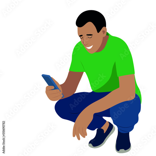 Portrait of a indian guy who is squatting with a phone in his hand, vector isolated on a white background, the guy looks at the smartphone
