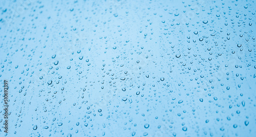 Water drops on glass, selective focus, texture of drops on glass