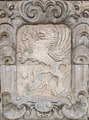 Medieval stone bas-relief with heraldic royal lion