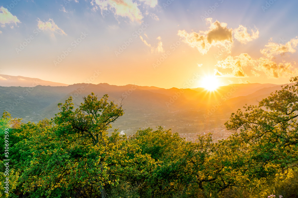 graet highland landscape with scenic view from mountain to below to a walley with majectic mountains and scenic cloudy sunset on background graet highland landscape with scenic view from mountain to below to a walley with majectic mountains and scenic cloudy sunset on background