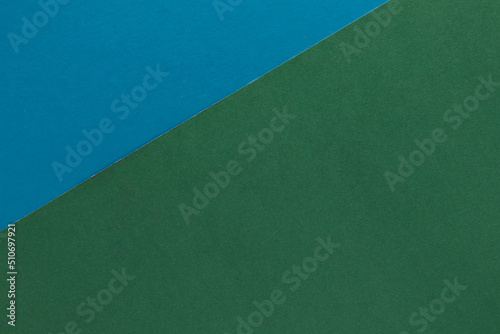 Two-color paper texture background in blue and green
