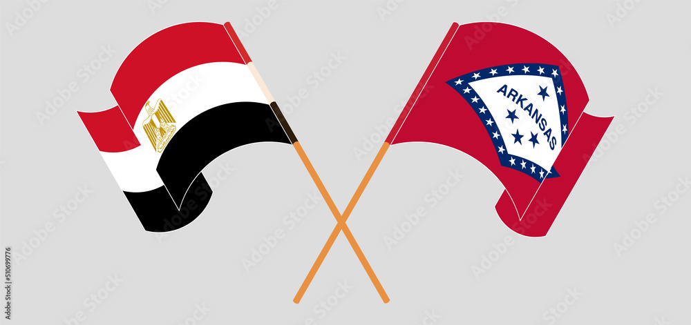 Crossed and waving flags of Egypt and The State of Arkansas