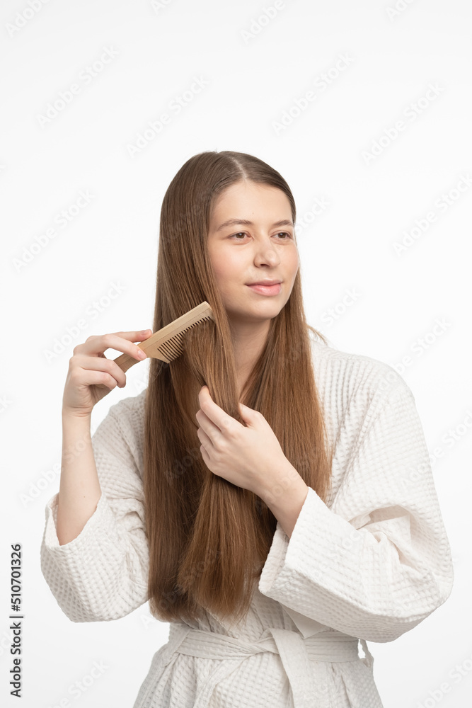 Portrait of beautiful woman. Female skin care. Healthy long natural hair and beauty skin. Moisturizer cream and eye patches. Portrait of beautiful woman. Female skin care. Healthy long natural hair and beauty skin. Moisturizer cream and eye patches.