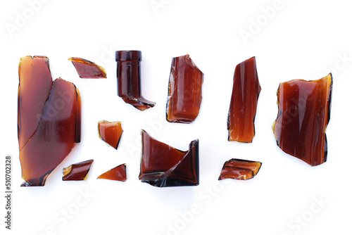 Canvas Print Parts of a broken bottle flat lay on a white background top view