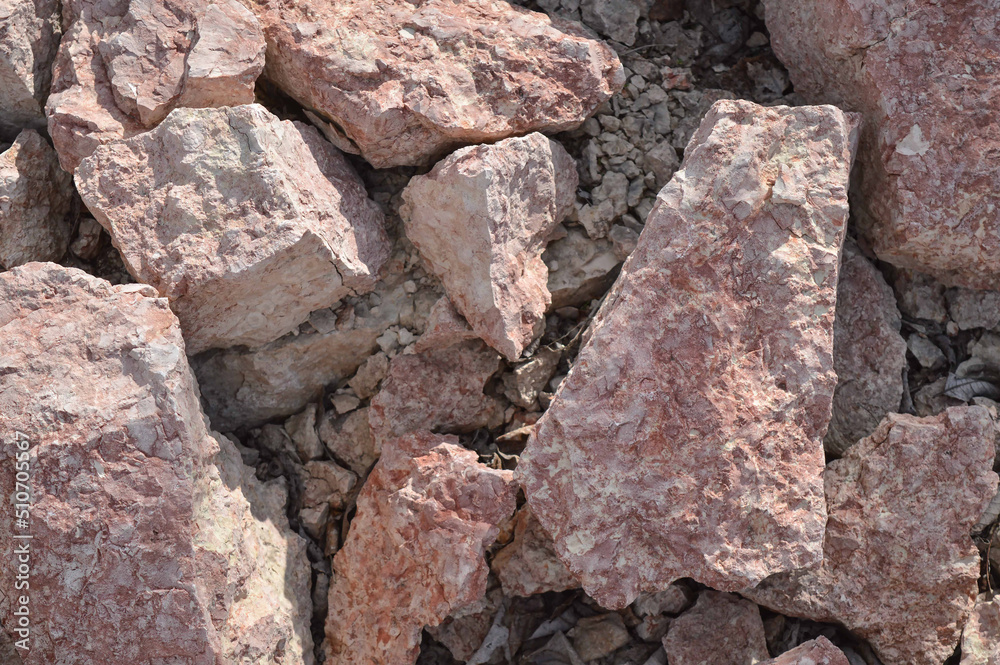 Fototapeta premium The texture of a pile of limestone stones