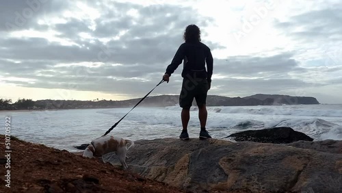 person walking on the beach
