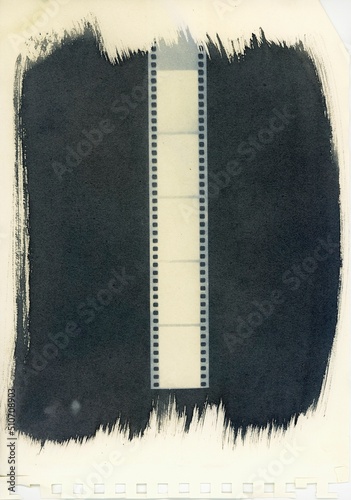35mm film strip print on black and paper texture