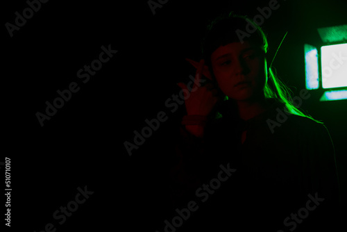 Girl elf in the dark and neon light