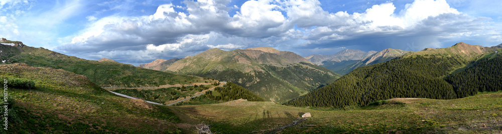 Fototapeta premium Colorado, mountain, cloud, blue sky, spring, green grass, panoramic