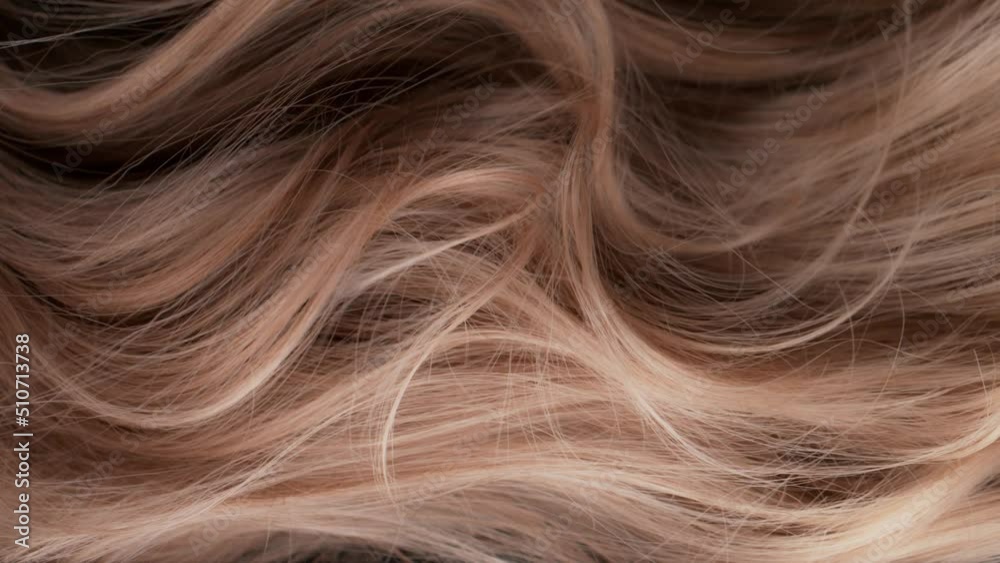 Super Slow Motion Shot of Waving Light Brown Highlighted Hair at 1000 fps.