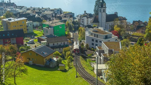 Time lapse. Swiss standard gauge rack railway. Mountain railway, Rigi Railways. Vitznau, Canton Lucerne, Switzerland. photo