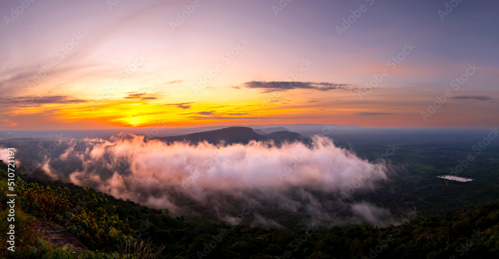 Panorama Beautiful Clouds and fog above mountain, beautiful morning sunshine landscape at Pha Mo i Daeng Phra Wihan National Park. Sisaket province,Thailand,ASIA.
