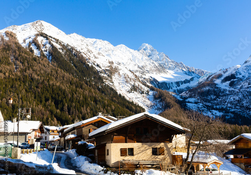 Picturesque winter view of French Alps ridge in ski and mountaineering village of Argentiere in Chamonix-Mont-Blanc commune on sunny day