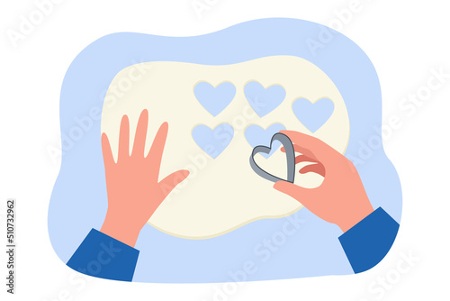 Man cutting cookies out of dough flat vector illustration. Person preparing biscuits using heart shaped cutter. Bakery, homemade food concept for banner, website design or landing web page