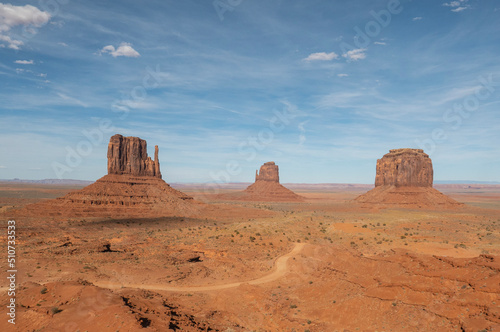scenic view to monument valley with butte and blue sky
