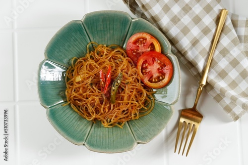 Top View Spicy Bihun Goreng or Fried Rice Vermicelli with Vegetables. photo