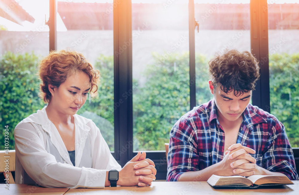 Christian Praying on open Bible. Christian Praying on open Bible.