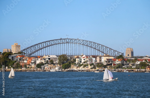 Cityscape with a bridge of the bay, small boats on a water, Sydney, Australia