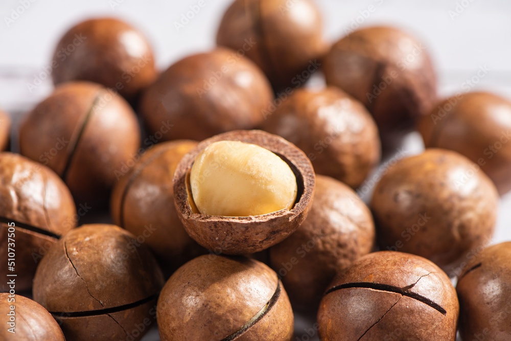 Macadamia nuts on wooden table