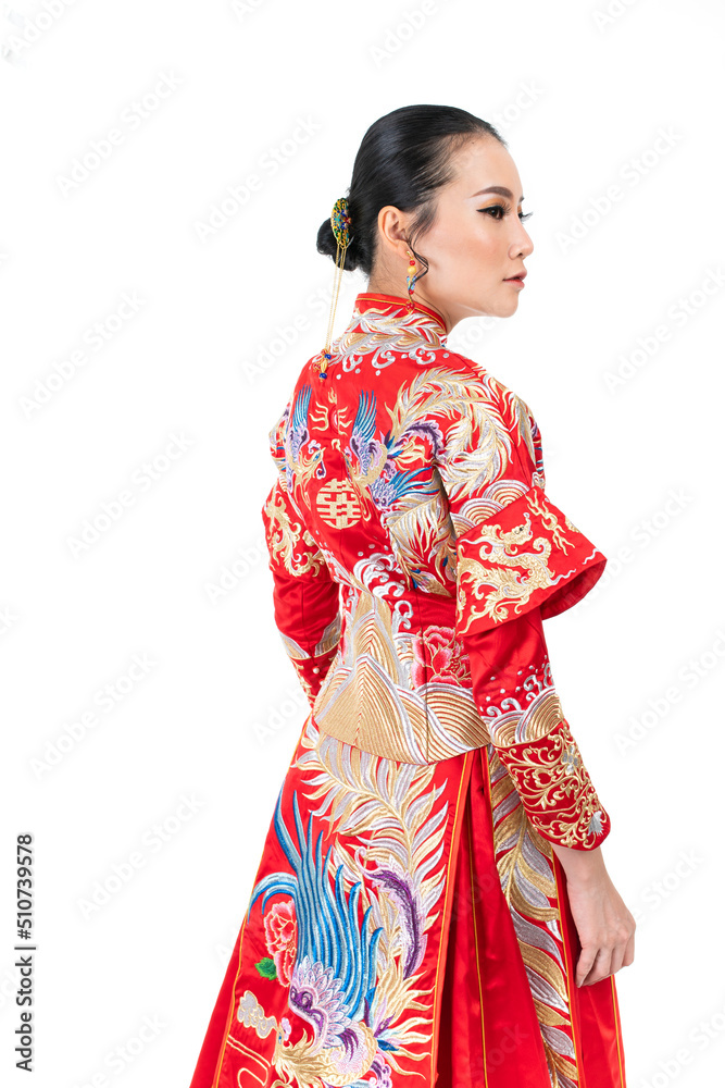 Portrait of a young asian Chinese female lady model wearing red traditional vintage wedding dress costume smiling and posing with different poses and gestures Portrait of a young asian Chinese female lady model wearing red traditional vintage wedding dress costume smiling and posing with different poses and gestures