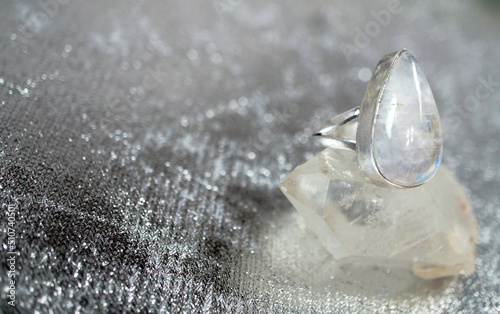 Moonstone Silver Gemstone Ring on Crystal Display