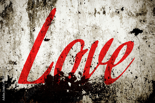 old wall with the word LOVE