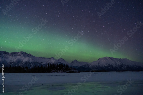 Aurora sky in Alaska with strong Northern Lights © KBDESIGNPHOTO