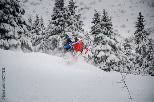 Alaska snowmachine rider in Alaskan backcountry