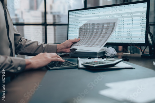 Investors  check data cost, balance, profit and  currency. Accounting and  Financial concept.