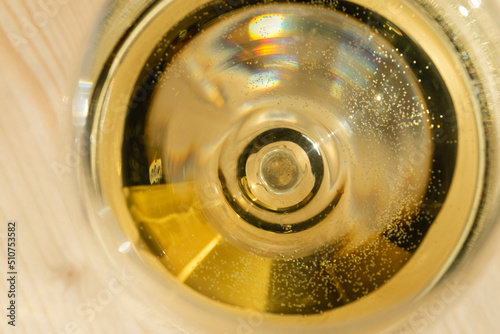 Top view of the contents of a glass with white wine. Copy space