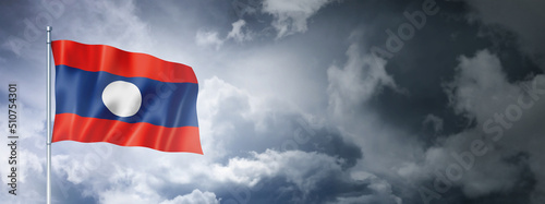 Laos flag on a cloudy sky