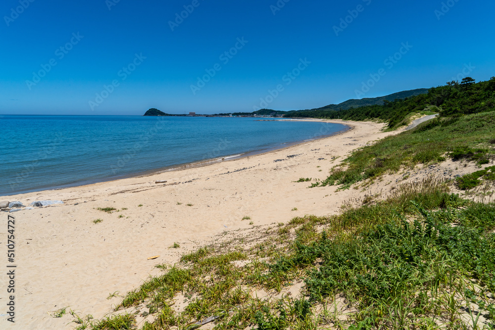 Sand beach and waves in countryside of  Japan.