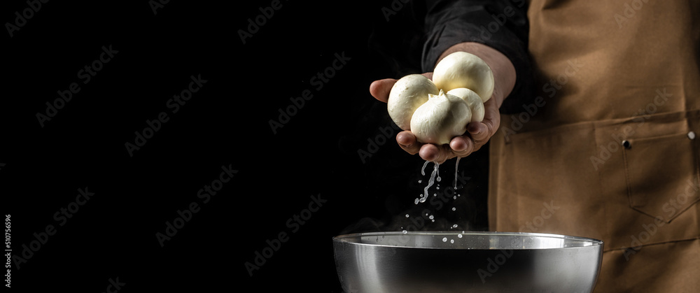 Cheesemaker, showing freshly made mozzarella. The homemade cheese maker ...