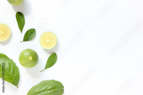 Flat Lay Fresh limes on white background  top view.