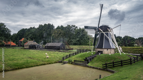 A mill In the open air museum on a cloudy summer day, Enkhuizen, the Netherlands.