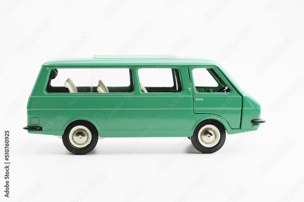  Toy model of a retro car, isolated, side view.