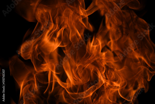 Fire blaze flames on black background. Fire burn flame isolated, abstract texture. Flaming explosion effect with burning fire.