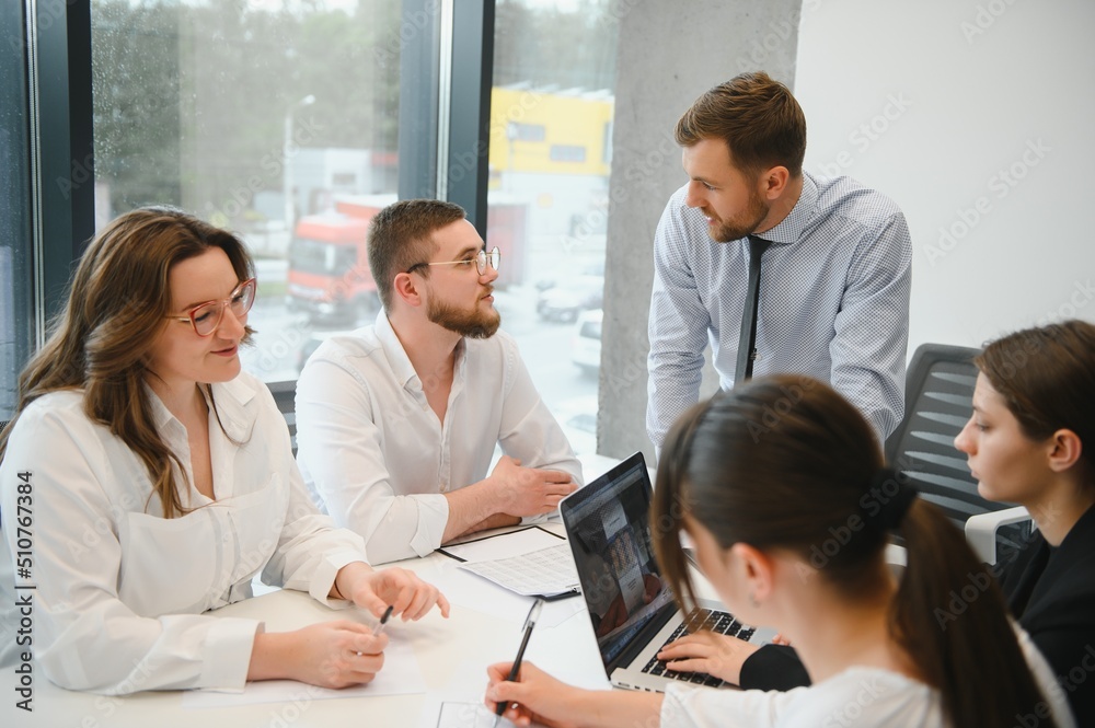 Business people working on project in office