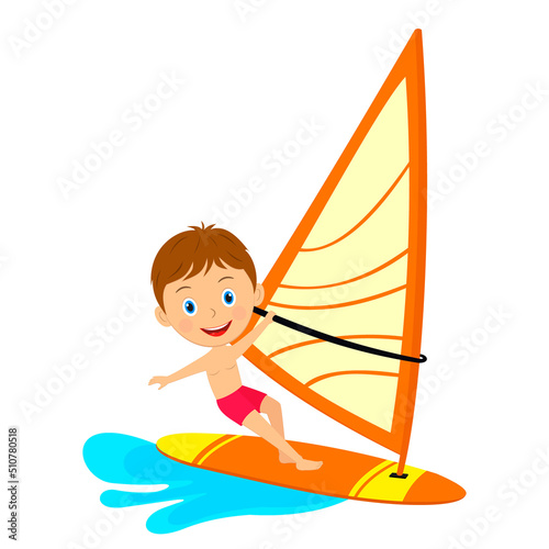 Young boy windsurfing  in the sea