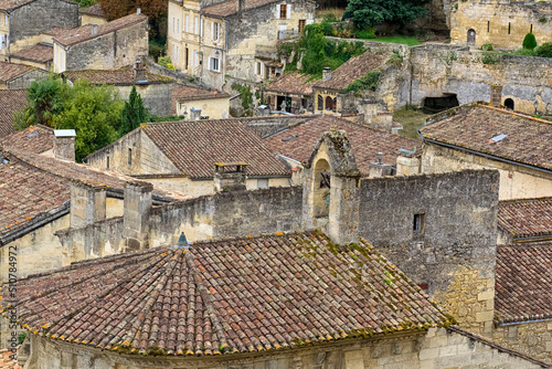 SAINT-EMILION, FRANCE - SEPTEMBER 07, 2017:  Aerial view  of the tiled rooftops in this pretty Town photo