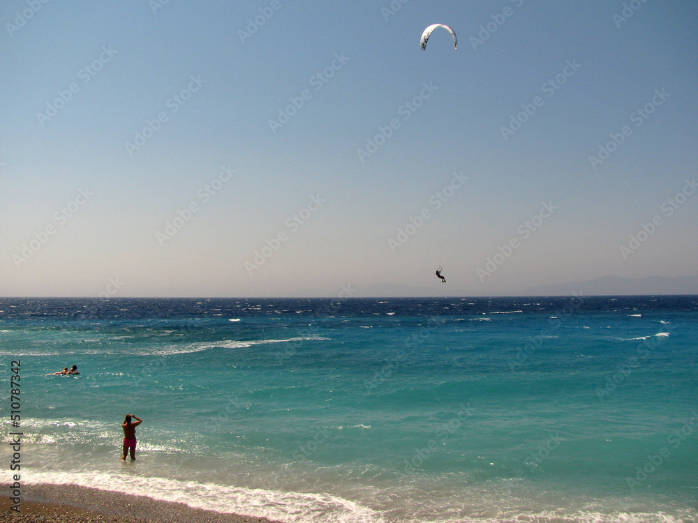 Obraz premium kite surfing on the beach