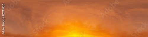 A red burning sunset sky panorama with Cirrus clouds. Hdr seamless spherical equirectangular 360 panorama. Sky dome or zenith for 3D visualization and sky replacement for aerial drone 360 panoramas.