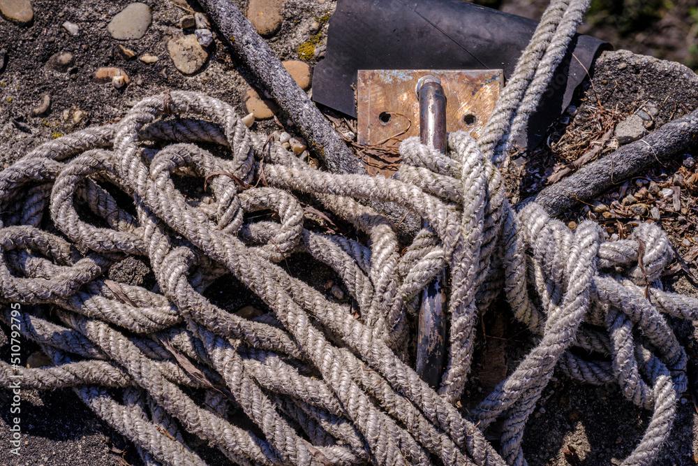 Detail of a rope from a fishing boat moored to a dock in Galicia (Spain)