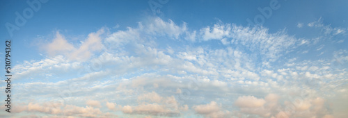 Blue sky background with tiny clouds, panorama