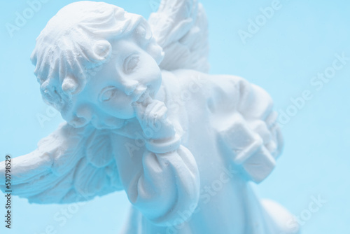 Print op canvas Top view of little beautiful guardian angel on the cloud