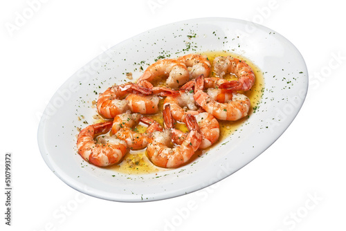 White plate with baked shrimps and garlic Isolated